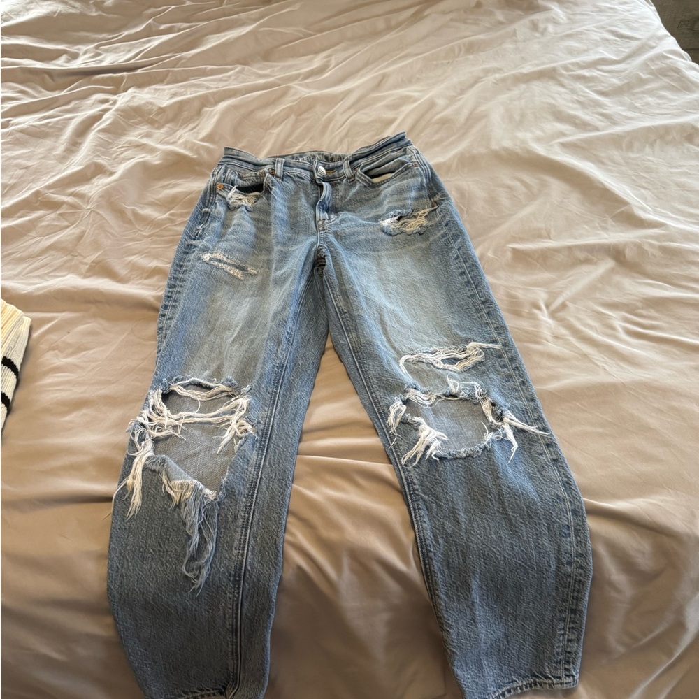Distressed Blue Jeans